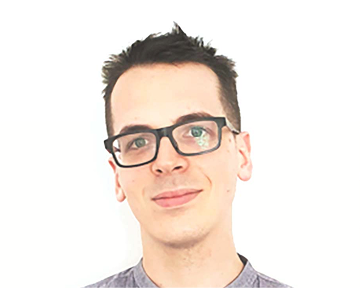 A man with glasses wearing a collared shirt