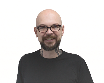 A bald man with glasses and a beard is wearing a black t-shirt